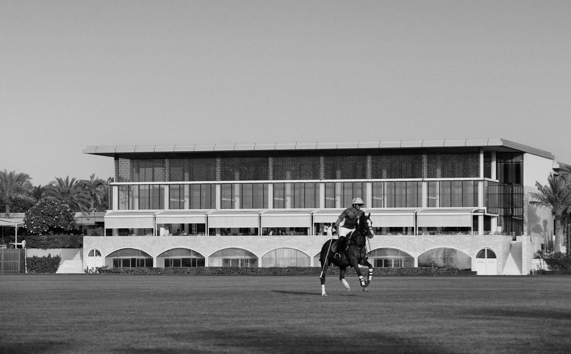 Melia Desert Palm Member Of Melia Collection Dubai Exterior photo The main stand at the Meydan Racecourse