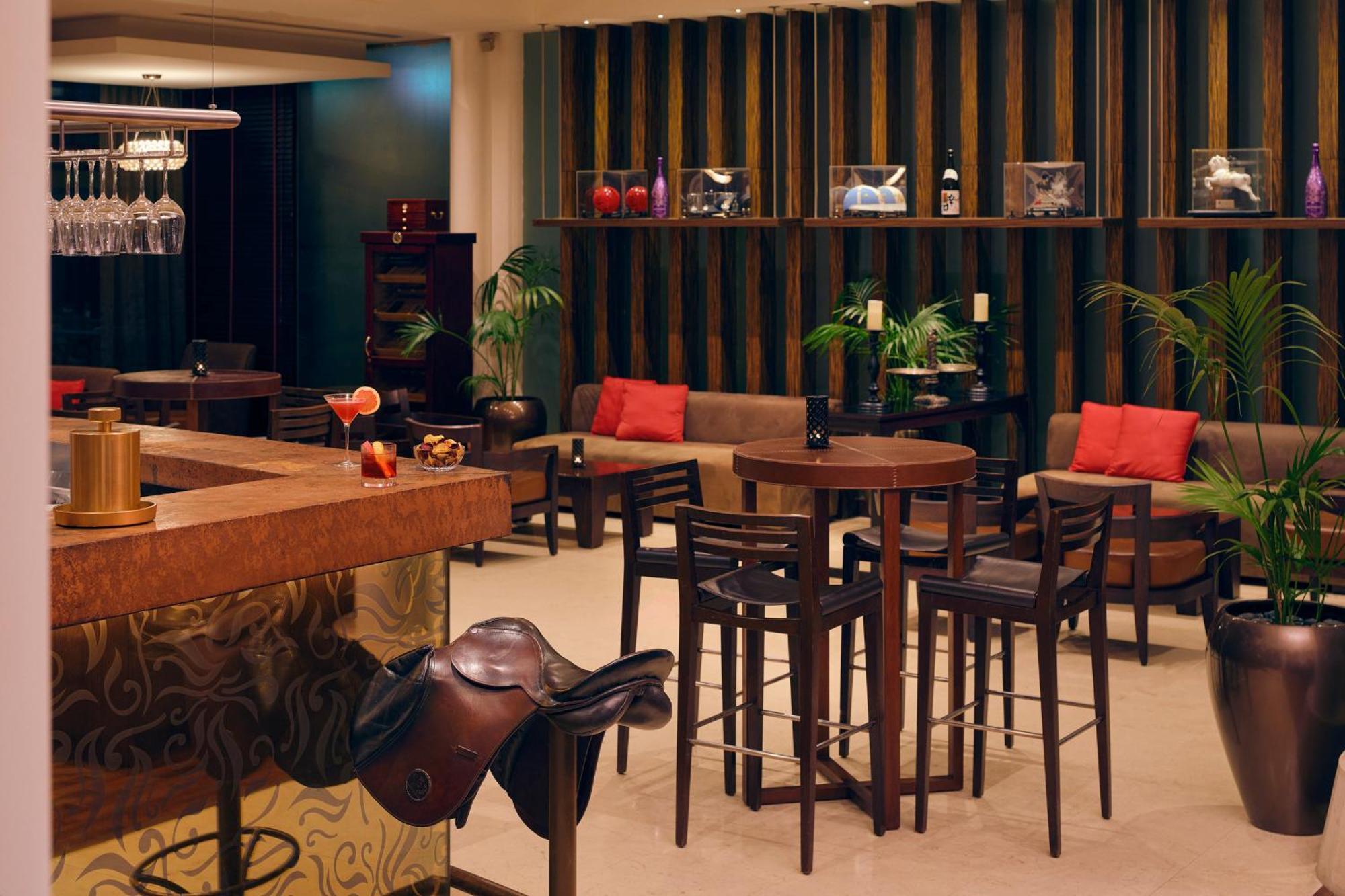 Melia Desert Palm Member Of Melia Collection Dubai Exterior photo The bar at the hotel